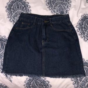 Brand New jean skirt with frayed design bottom
